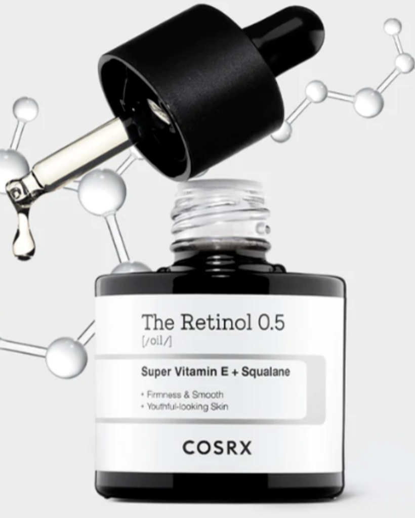 Cosrx skincare serum bottle with dropper on a light gray background