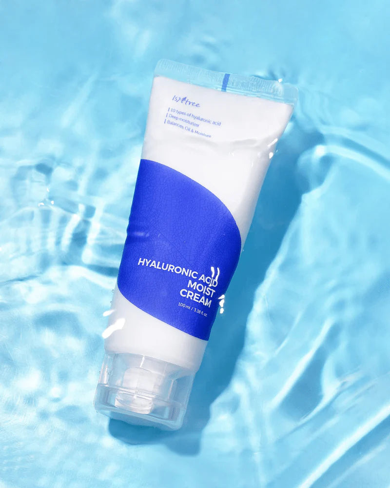 Tube of hyaluronic acid moist cream on a blue water background