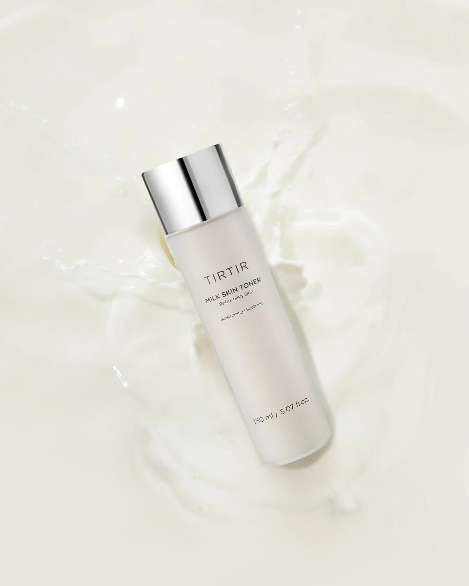 Toner bottle with silver cap on a white background